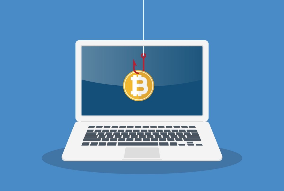 Bitcoin on phishing hook warns investors of online crypto scams.